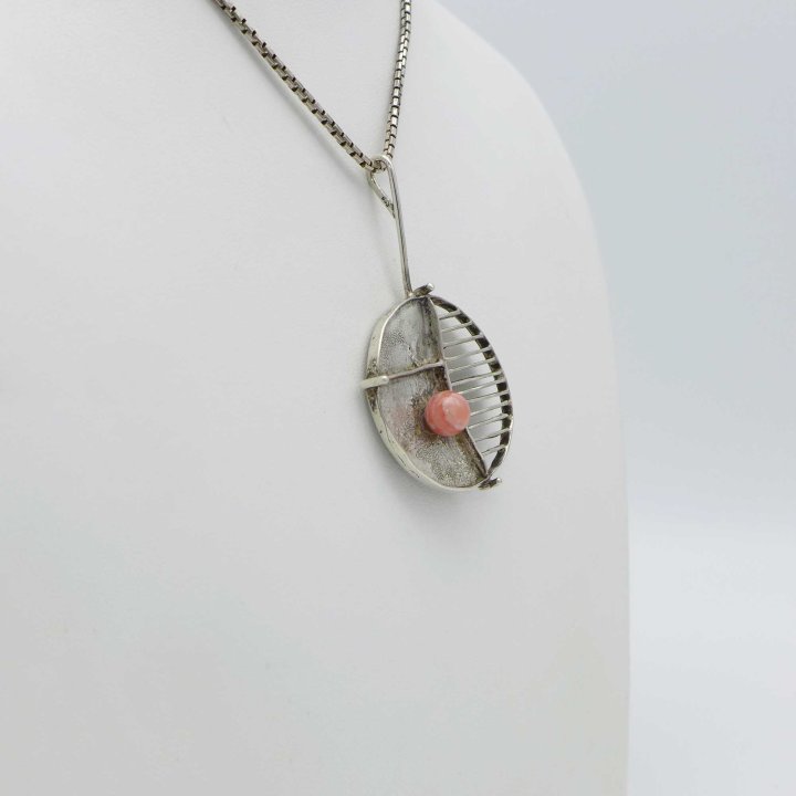 Handcrafted silver pendant with rhodochrosite