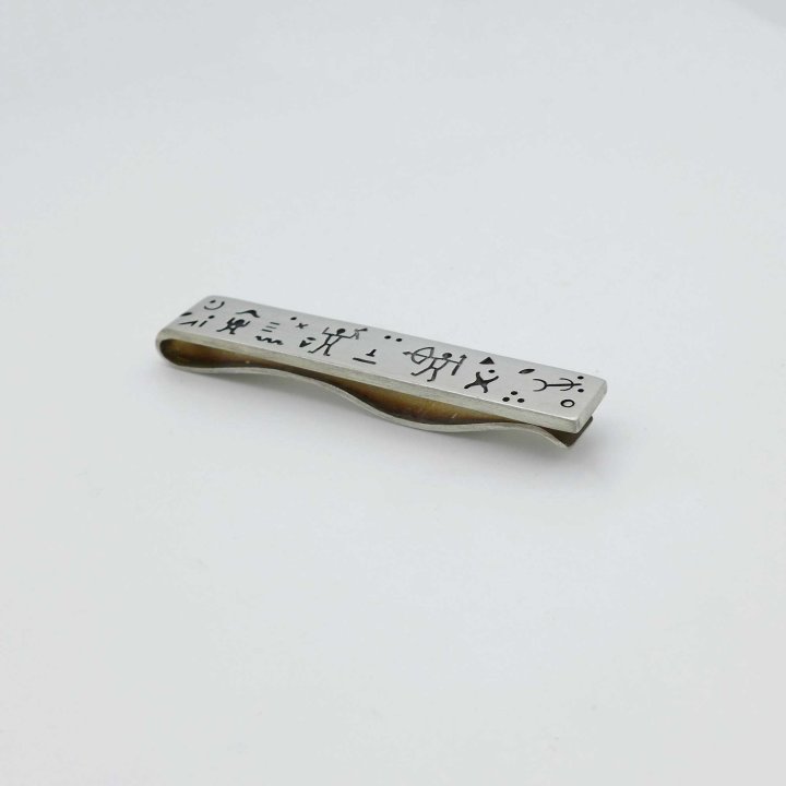 Engraved tie bar from North America