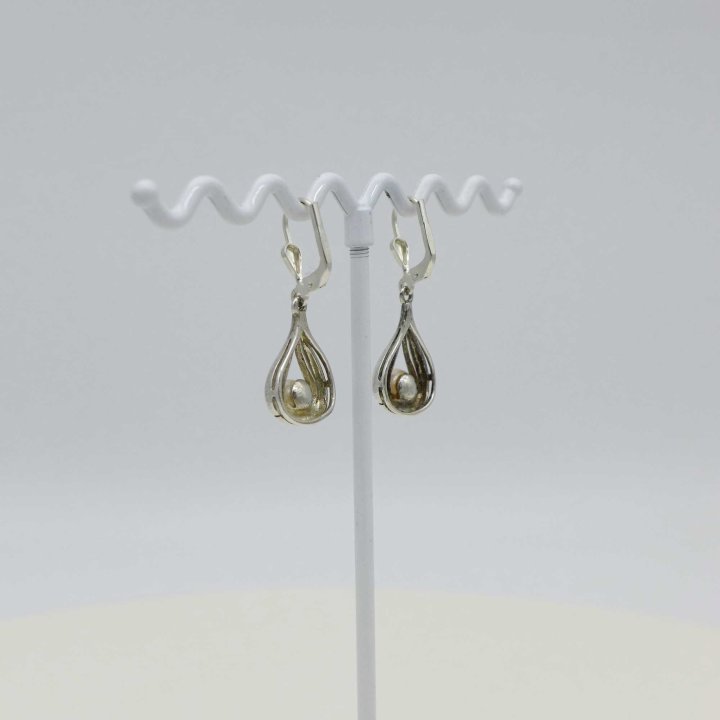 Silver earrings with pearl pendants