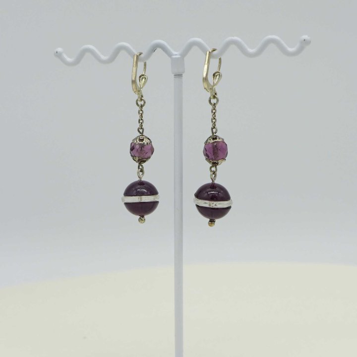 Long earrings with amethyst-coloured crystal glass beads