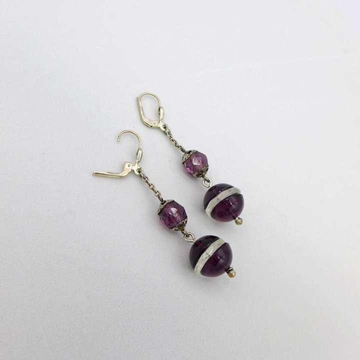 Long earrings with amethyst-coloured crystal glass beads