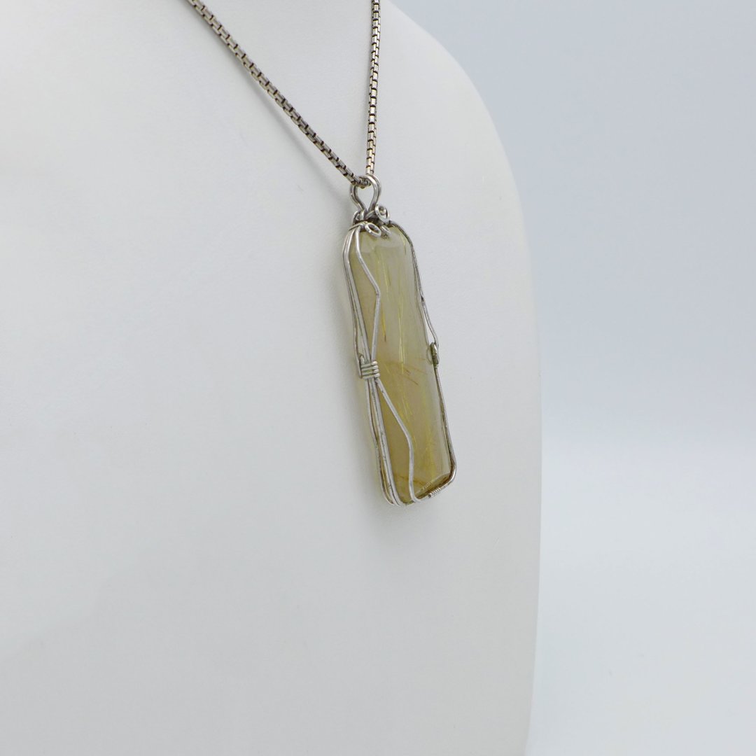 Handmade pendant with rutile quartz