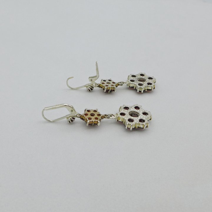 Large earrings with garnet flowers