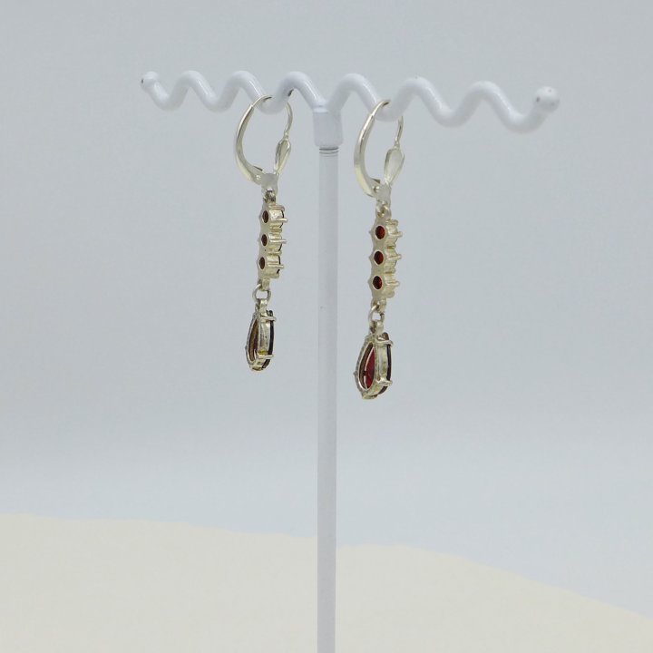 Earrings with garnet drops