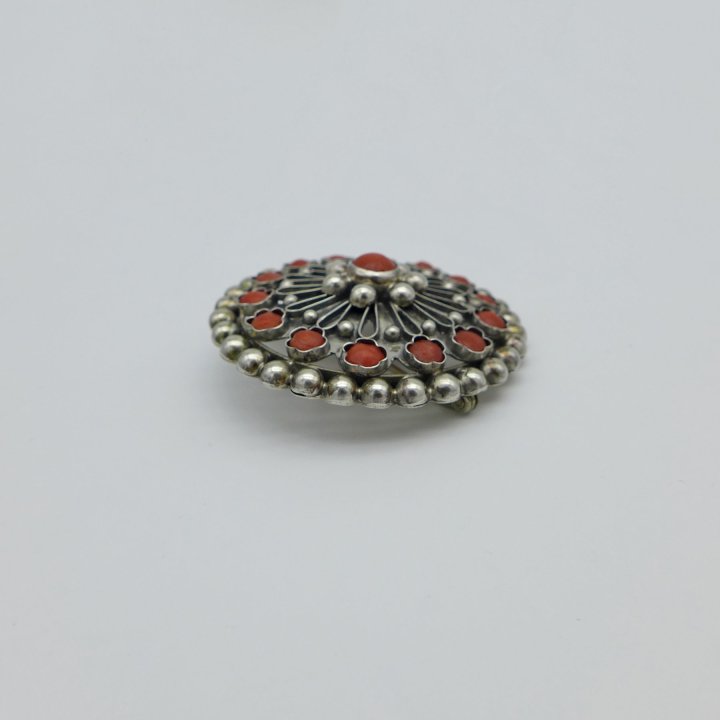 Handmade shield brooch with corals