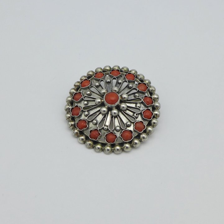 Handmade shield brooch with corals