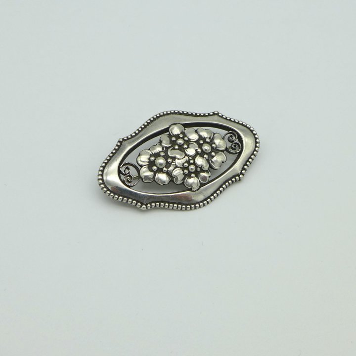 Handcrafted silver brooch with anemone flowers