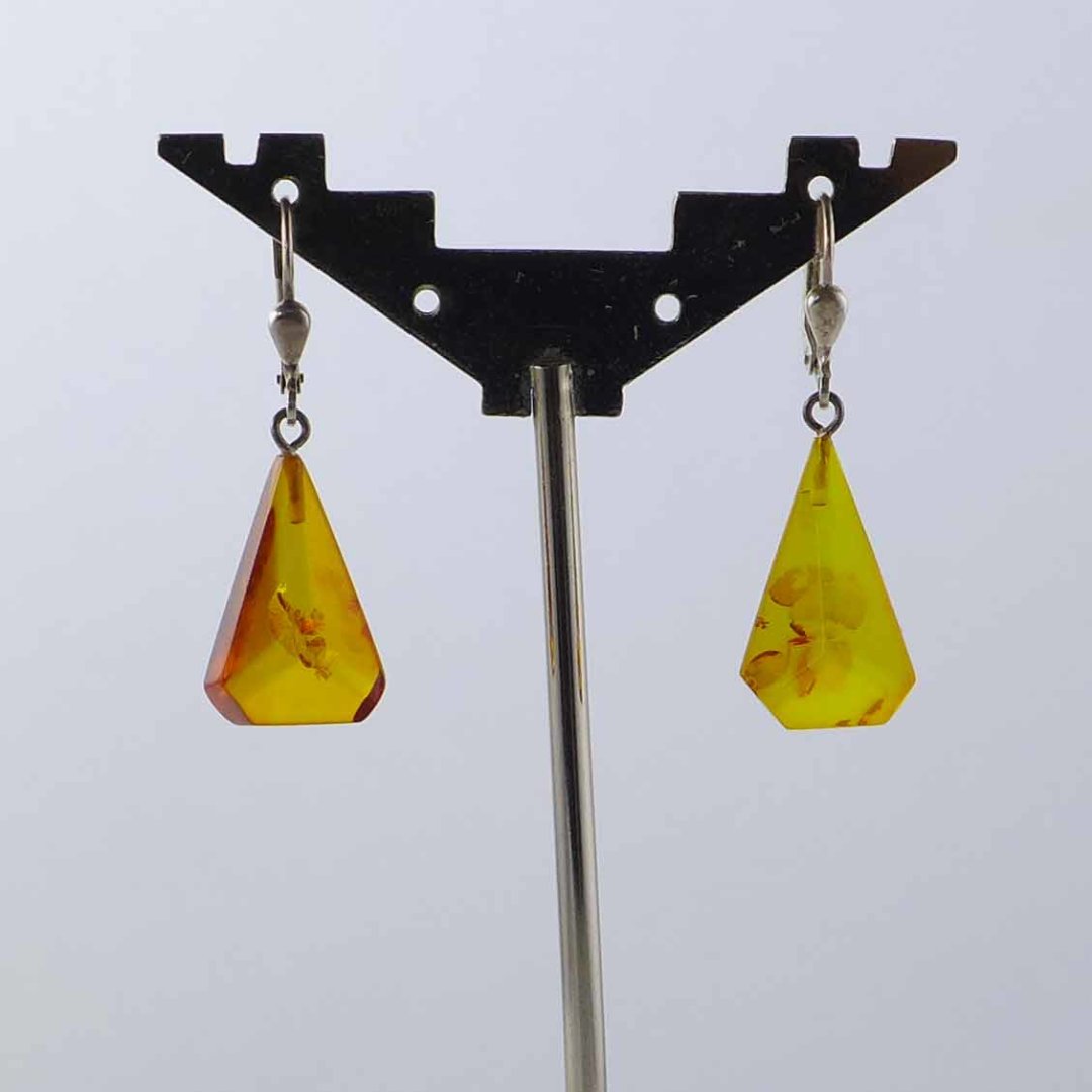 Silver earrings with light amber triangles