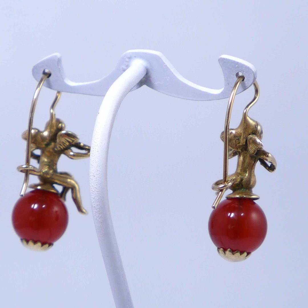 Earrings with angels and carnelian